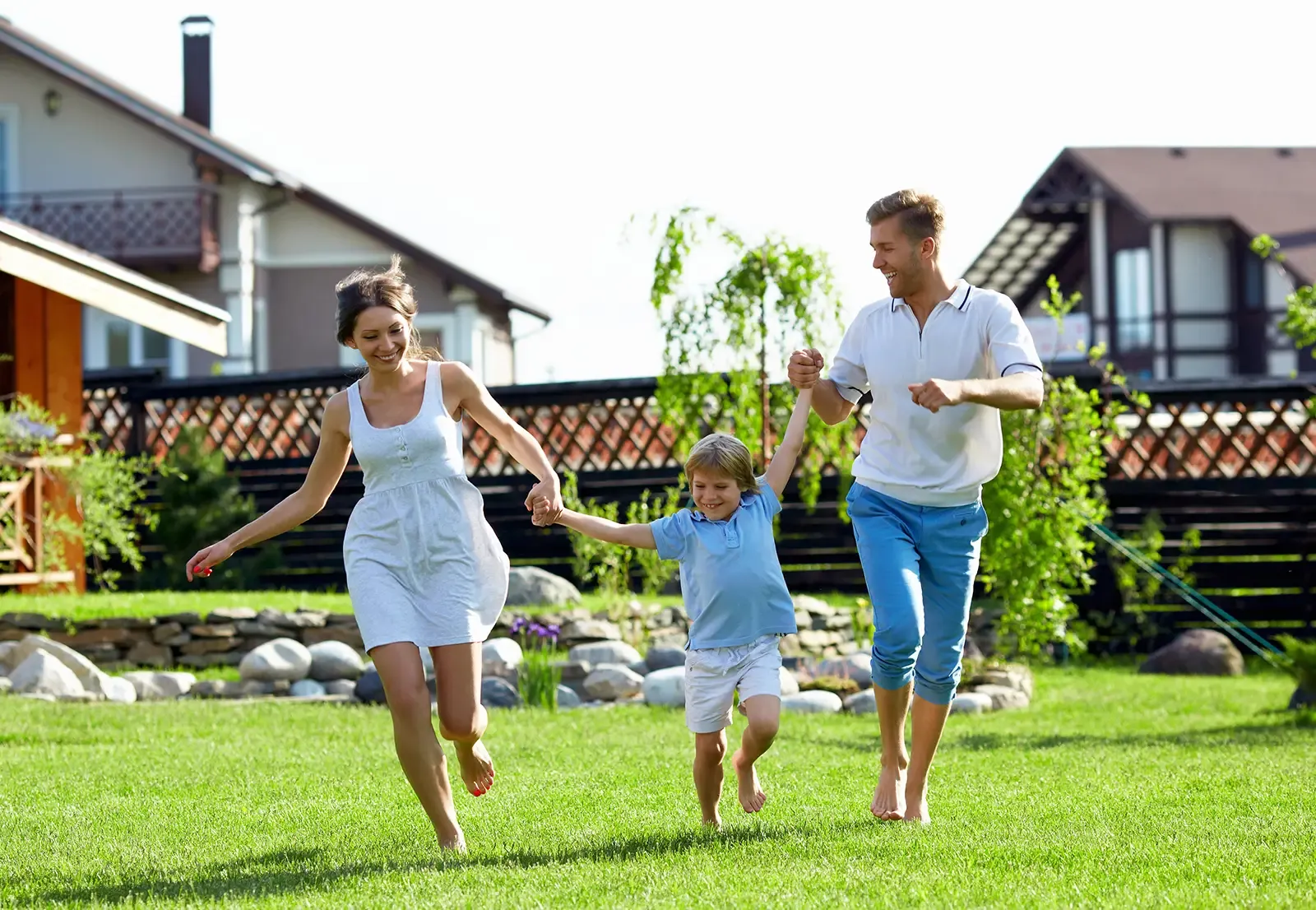 family in fresh cut lawn