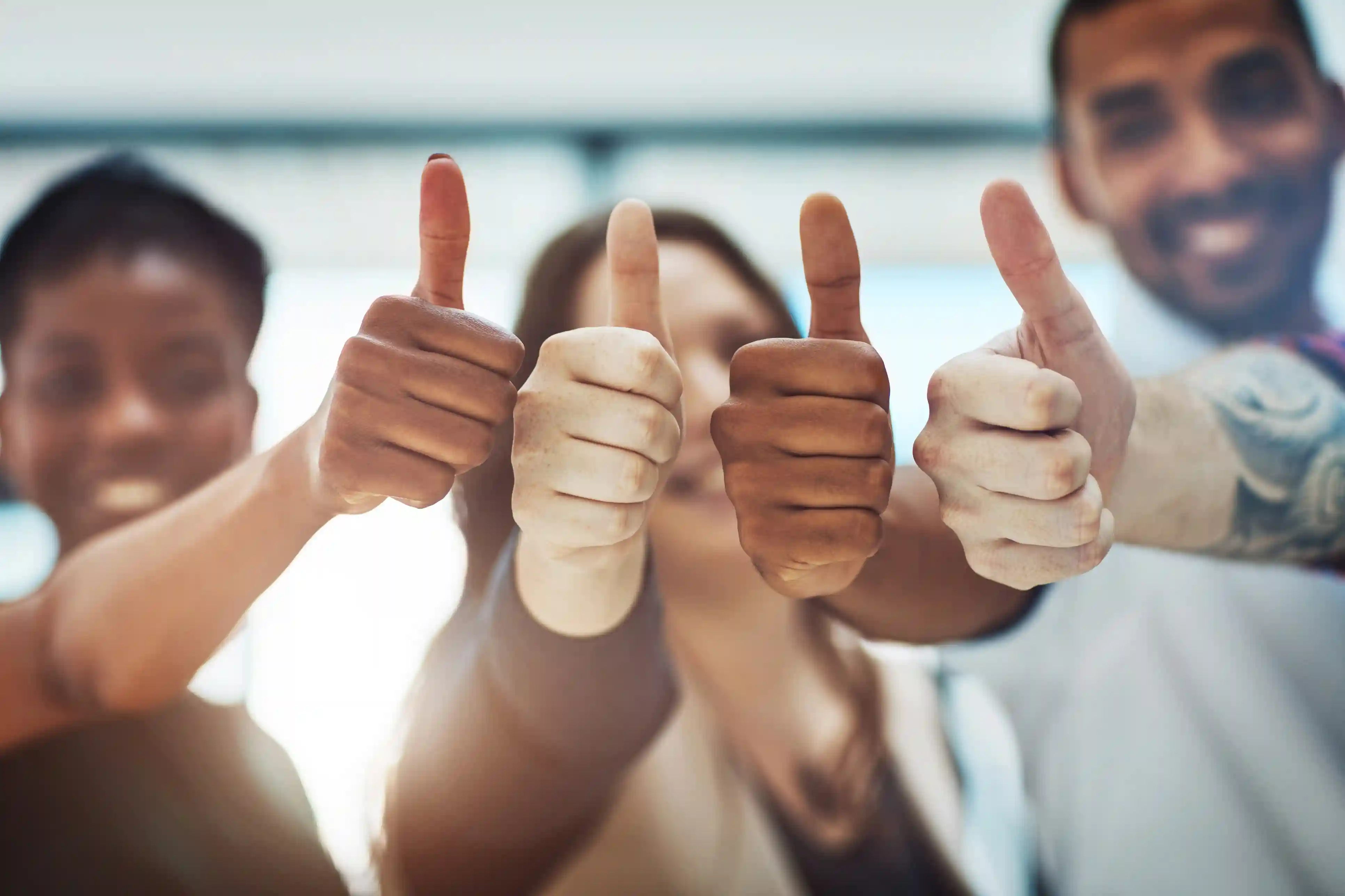 thumbs up group photo